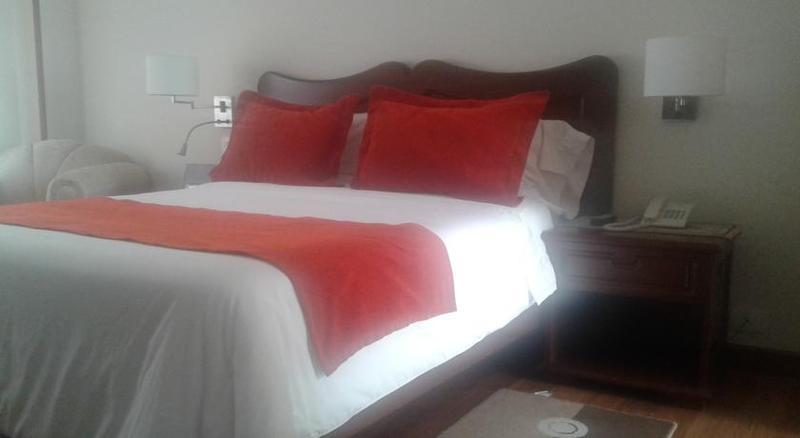 Hotel Santa Lucia Boutique Spa ボゴタ エクステリア 写真 A bed with a duvet cover