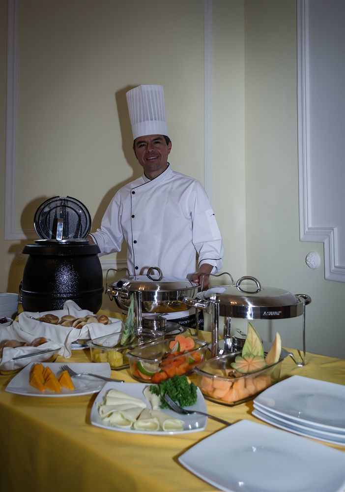 Hotel Santa Lucia Boutique Spa ボゴタ エクステリア 写真 A buffet at a hotel